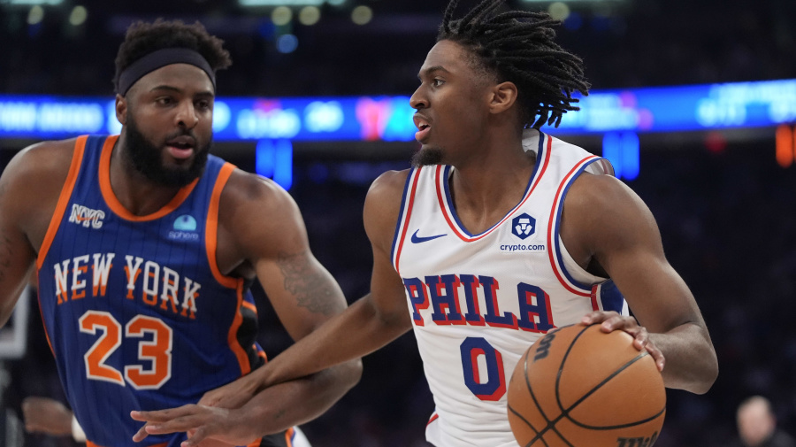 Associated Press - Philadelphia 76ers' Tyrese Maxey (0) looks to pass as New York Knicks' Mitchell Robinson (23) defends during the first half of Game 5 in an NBA basketball first-round playoff series, Tuesday, April 30, 2024, in New York. (AP Photo/Frank Franklin II)