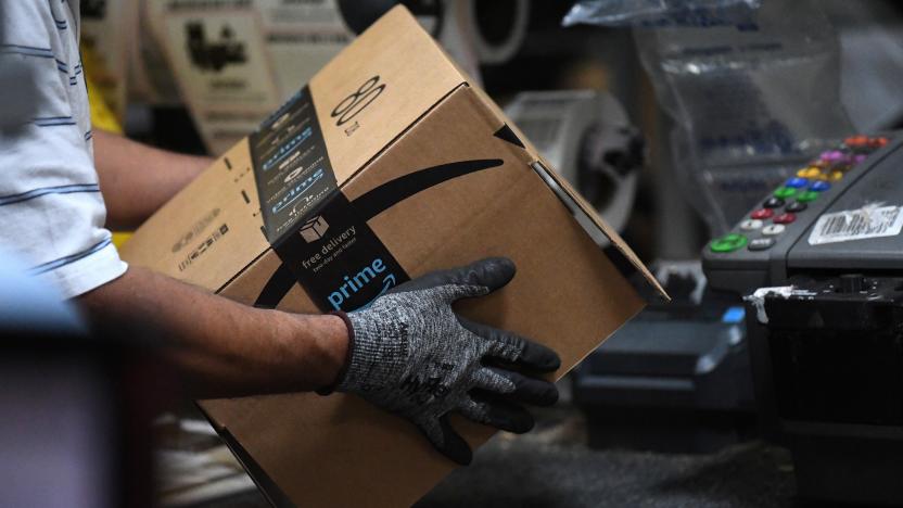 A worker assembles a box for delivery at the Amazon fulfillment center in Baltimore, Maryland, U.S., April 30, 2019. REUTERS/Clodagh Kilcoyne