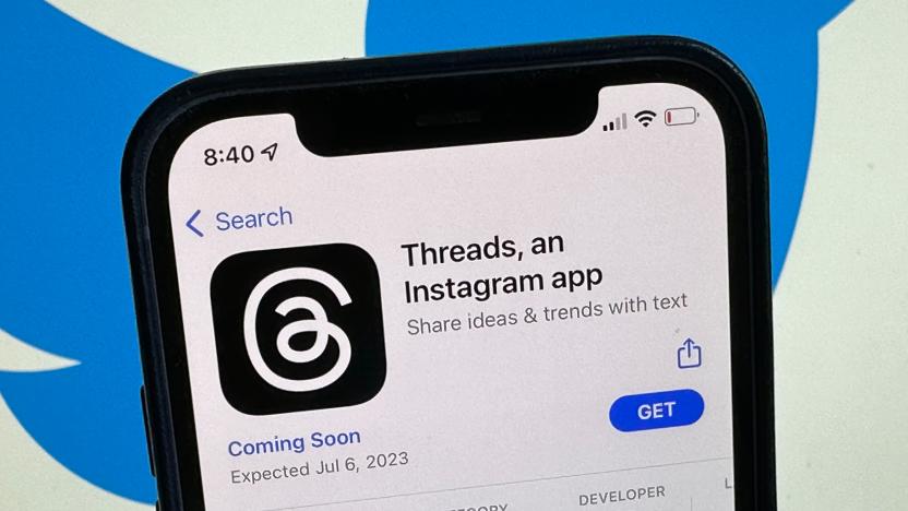 04 July 2023, Berlin: The announcement of the social media app Threads is displayed in Apple's US App Store. The Twitter logo can be seen in the background. The eagerly awaited Twitter competitor from Facebook Group Meta is scheduled to launch on July 6, 2023.      (to dpa "Facebook Group to make Twitter competitor available soon") Photo: Christoph Dernbach/dpa (Photo by Christoph Dernbach/picture alliance via Getty Images)