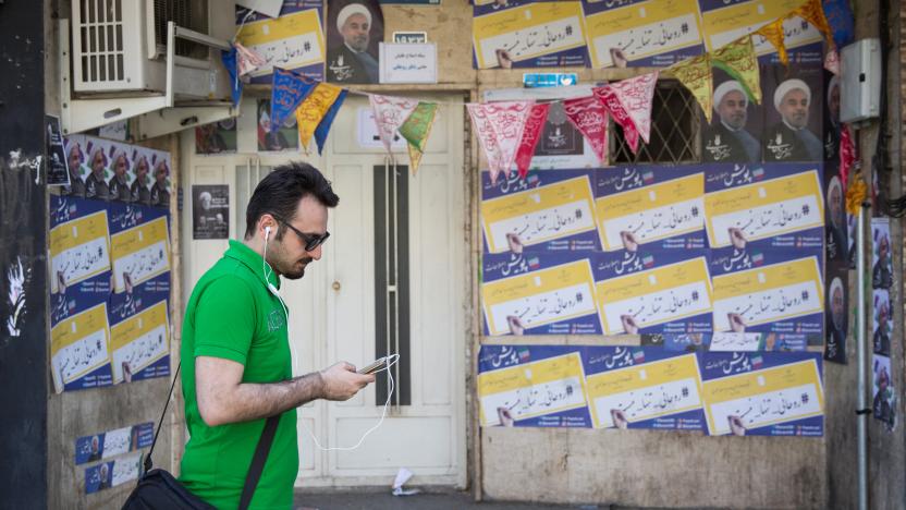 A man uses his smartphone to follow election news in Tehran, Iran May 17, 2017. REUTERS/TIMA ATTENTION EDITORS - THIS IMAGE WAS PROVIDED BY A THIRD PARTY. FOR EDITORIAL USE ONLY.