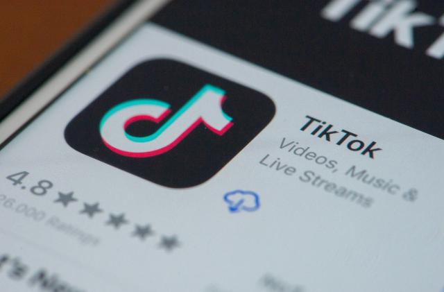 An user opening TikTok on his iPhone in L'Aquila, Italy, on January 23, 2021. The Privacy Guarantor has ordered the block for the TikTok users without ascertained age. (Photo illustration by Lorenzo Di Cola/NurPhoto via Getty Images)