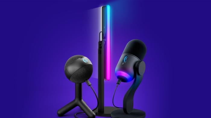 Marketing image of the Logitech Yeti Orb (left), Yeti GX (right) microphones flanking the Litra Beam LX desktop light. Purple background.