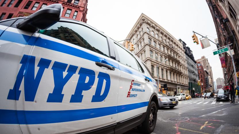 Close up of the NYPD logo on a police car.