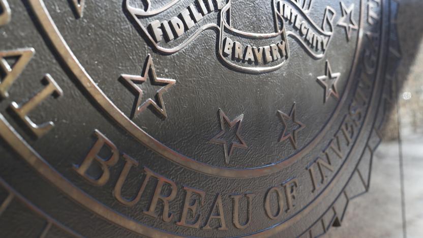 The crest for the Department of Justice, Federal Bureau of Investigations is seen on the outside of the J. Edgar Hoover FBI Building in Washington, U.S., March 12, 2019. REUTERS/Leah Millis