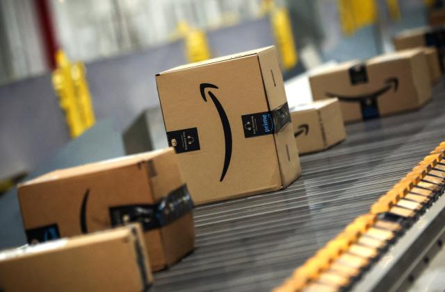 Packages travel on a conveyor during Cyber Monday at the Amazon's fulfillment center in Robbinsville, New Jersey, U.S., November 27, 2023. REUTERS/Mike Segar