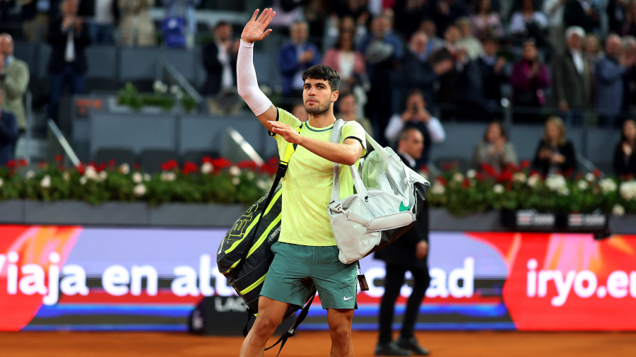 Getty Images - MADRID, SPAIN - MAY 01: Carlos Alcaraz of Spain waves to the crowd after losing his Men’s Singles quarter-final match to Andrey Rublev of Russia on Day Nine of the Muta Madrid Open at La Caja Magica on May 01, 2024 in Madrid, Spain. (Photo by Clive Brunskill/Getty Images)