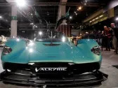 Aston Martin delays first electric car as losses narrow