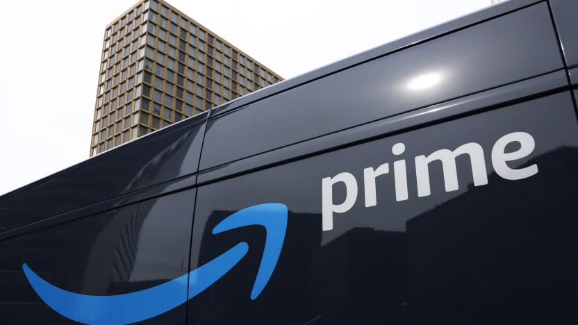 FILE - An Amazon Prime delivery vehicle is seen in downtown Pittsburgh on March 18, 2020. The Federal Trade Commission sued Amazon on Wednesday for what it called a years-long effort to enroll consumers without consent into its Prime program and making it difficult for them to cancel their subscriptions. (AP Photo/Gene J. Puskar, File)