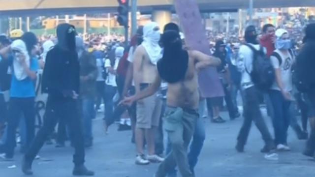 Raw: Brazilian Police, Protesters Clash