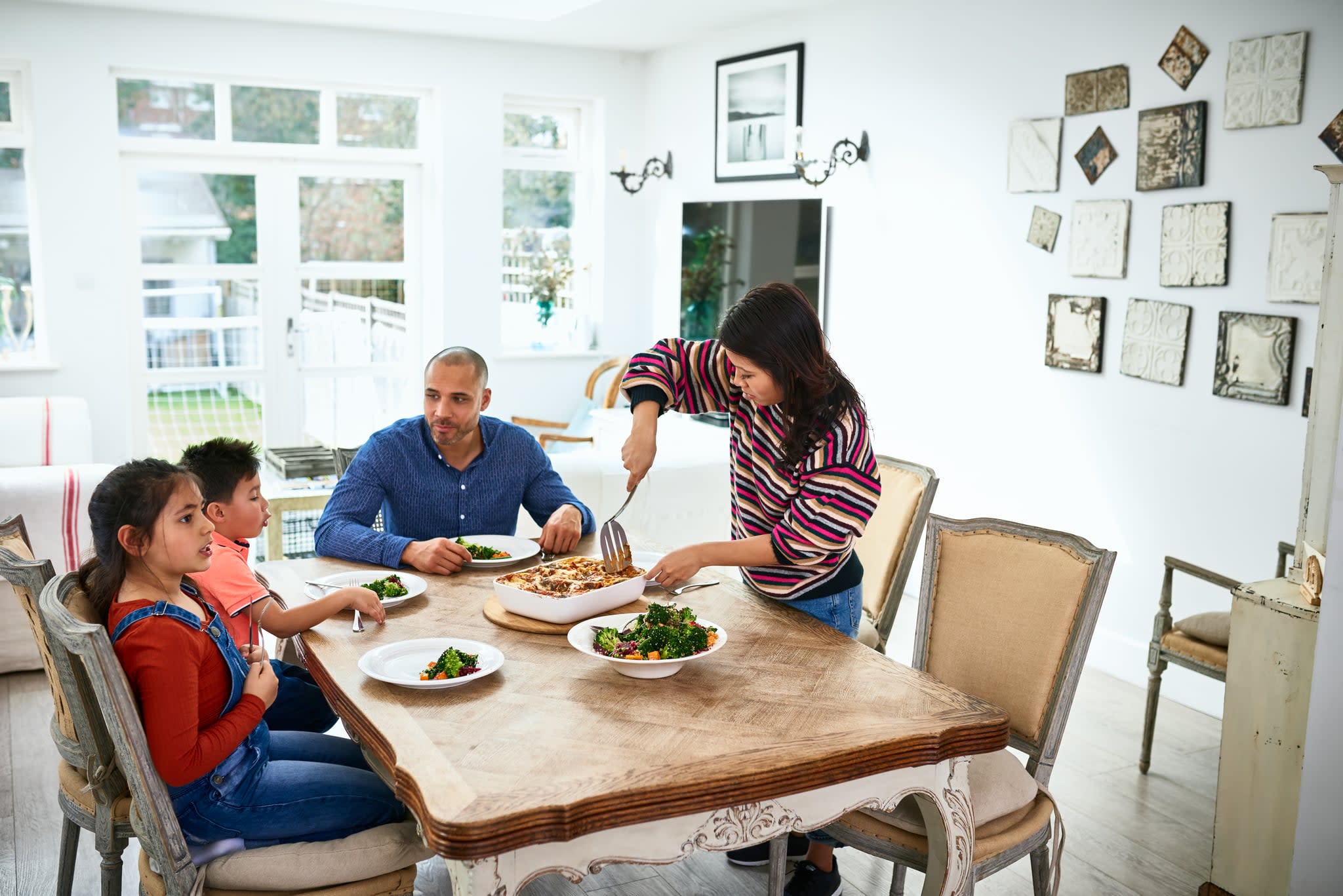 Hanging Family Photos In Dining Room