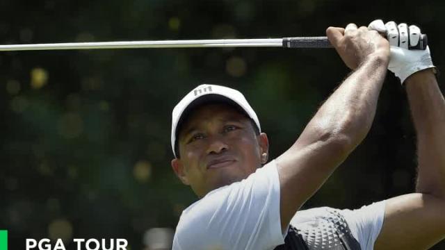 Tiger Woods goes on early run, falters late Saturday at Quicken Loans National