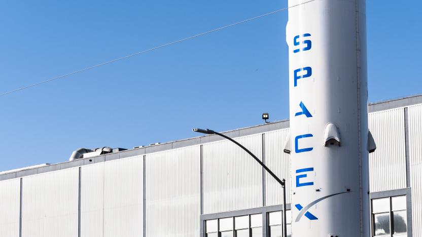 Dec 8, 2019 Hawthorne / Los Angeles / CA / USA - SpaceX (Space Exploration Technologies Corp.) headquarters; Falcon 9 rocket displayed in the front; SpaceX is a private American aerospace manufacturer