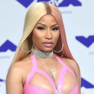 Nicki Minaj sizzles in a fur coat during 76-degree heat