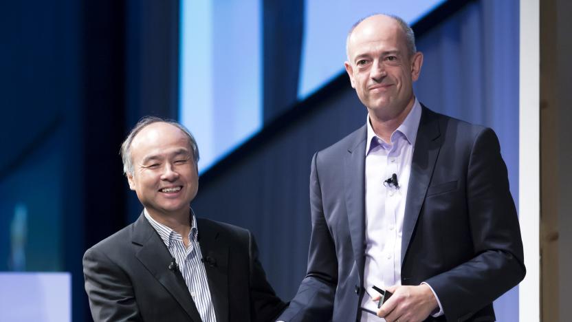 TOKYO, JAPAN - JULY 20:  SoftBank Group Corp. Chief Executive Officer Masayoshi Son, left, shakes hands with ARM Holdings Plc Chief Executive Officer Simon Segars during the SoftBank World 2017 conference on July 20, 2017 in Tokyo, Japan. With 70 speeches and sessions, the annual business event hosted by SoftBank, Japan's multinational telecommunications and internet company, takes place for 2 days until July 21. (Photo by Tomohiro Ohsumi/Getty Images)