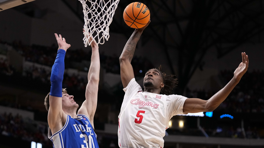 Associated Press - Houston's Ja'Vier Francis (5) goes up for a basket against Duke's Kyle Filipowski (30) during the first half of a Sweet 16 college basketball game in the NCAA Tournament in Dallas, Friday, March 29, 2024. (AP Photo/Tony Gutierrez)