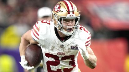 Associated Press - San Francisco 49ers running back Christian McCaffrey scores a touchdown against the Kansas City Chiefs in NFL Super Bowl 58 football game, Feb. 11, 2024, in Las Vegas. The 49ers rewarded McCaffrey with a contract extension after he won the AP Offensive Player of the Year award in his first full season with the team. (AP Photo/Doug Benc)