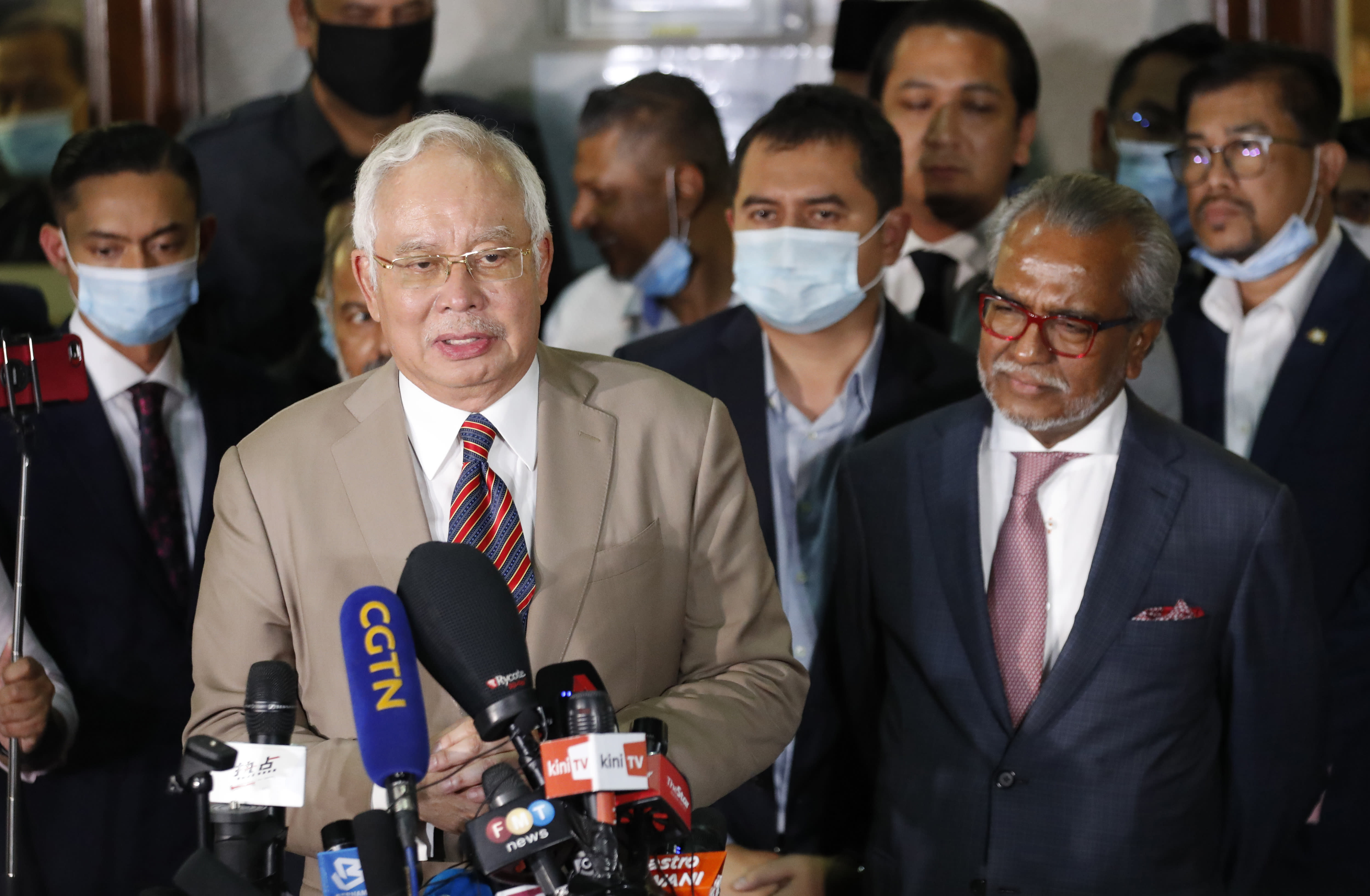 Malaysian ex-PM Najib given 12 years in jail in 1MDB scandal