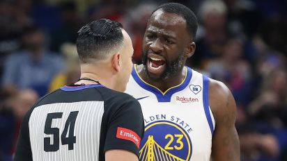 Getty Images - The Golden State Warriors' Draymond Green (23) screams at game official Ray Acosta (54) as teammate Stephen Curry (30) steps in at right during action against the Orlando Magic at the Kia Center on Wednesday, March 27, 2024, in Orlando, Florida. (Stephen M. Dowell/Orlando Sentinel/Tribune News Service via Getty Images)