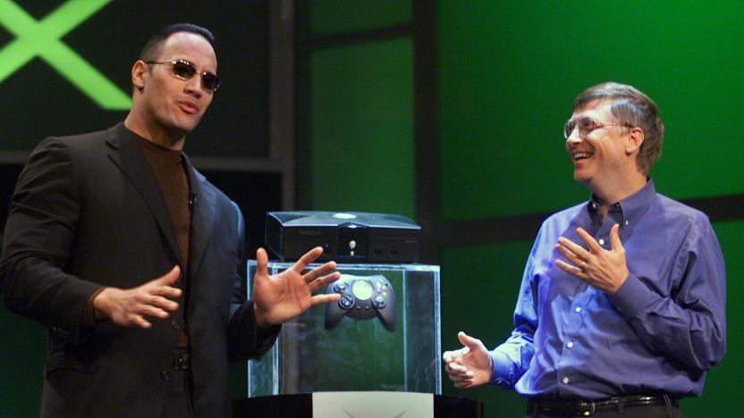 The Rock and Bill Gates on stage in the '90s.