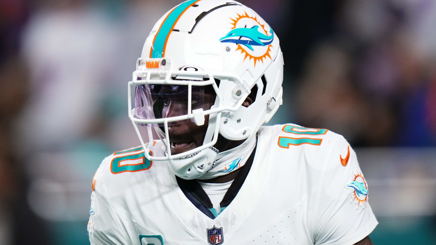 Getty Images - MIAMI GARDENS, FLORIDA - JANUARY 07: Tyreek Hill #10 of the Miami Dolphins warms up prior to a game against the Buffalo Bills at Hard Rock Stadium on January 07, 2024 in Miami Gardens, Florida. (Photo by Rich Storry/Getty Images)