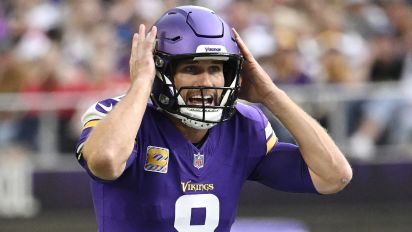 Beautiful Young Server in Minnesota Vikings Jersey Taking a Food Order