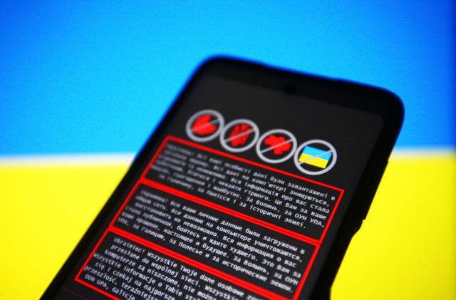 UKRAINE - 2022/01/14: In this photo illustration, a warning message in Ukrainian, Russian and Polish languages is displayed on a smartphone screen.
Hackers carried out attacks on several Ukraine's government websites, including the Ministry of Foreign Affairs, the Ministry of Education and Science, the State Service for Emergency Situation and others, reportedly by local media. This attack, on Ukrainian government web resources is the largest in the last four years. (Photo Illustration by Pavlo Gonchar/SOPA Images/LightRocket via Getty Images)