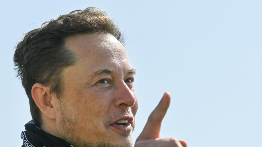 US entrepreneur and business magnate Elon Musk gestures during a visit at the Tesla Gigafactory plant under construction, on August 13, 2021 in Gruenheide near Berlin, eastern Germany. (Photo by Patrick Pleul / POOL / AFP) (Photo by PATRICK PLEUL/POOL/AFP via Getty Images)