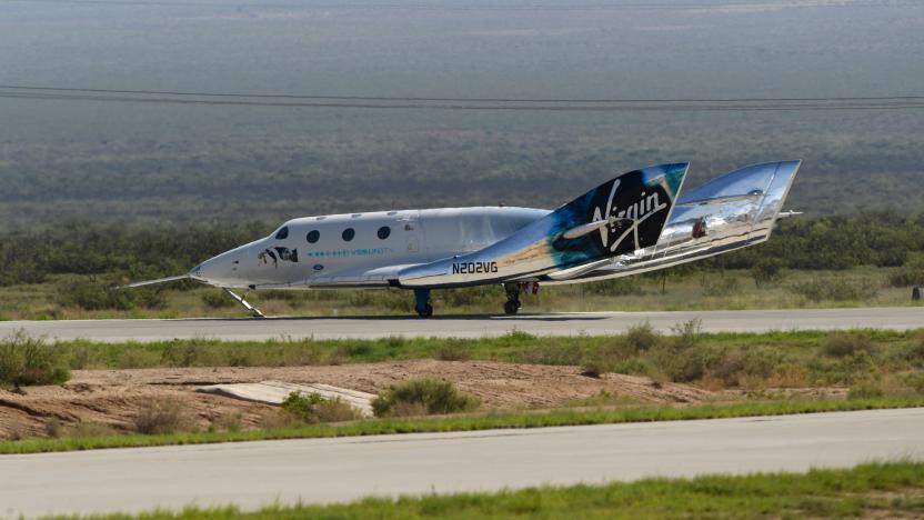 The Virgin Galactic SpaceShipTwo space plane Unity returns to earth after the mothership separated at Spaceport America, near Truth and Consequences, New Mexico on July 11, 2021. - Billionaire Richard Branson took off July 11, 2021 from a base in New Mexico aboard a Virgin Galactic vessel bound for the edge of space, a voyage he hopes will lift the nascent space tourism industry off the ground.A massive carrier plane made a horizontal take-off from Spaceport, New Mexico at around 8:40 am Mountain Time (1440 GMT) and will ascend for around an hour to an altitude of 50,000 feet (15 kilometers).The mothership will then drop a rocket-powered spaceplane called VSS Unity, which will ignite its engine and ascend at Mach 3 beyond 50 miles (80 kilometers) of altitude, which marks the boundary of space according to the United States. (Photo by Patrick T. FALLON / AFP) (Photo by PATRICK T. FALLON/AFP via Getty Images)