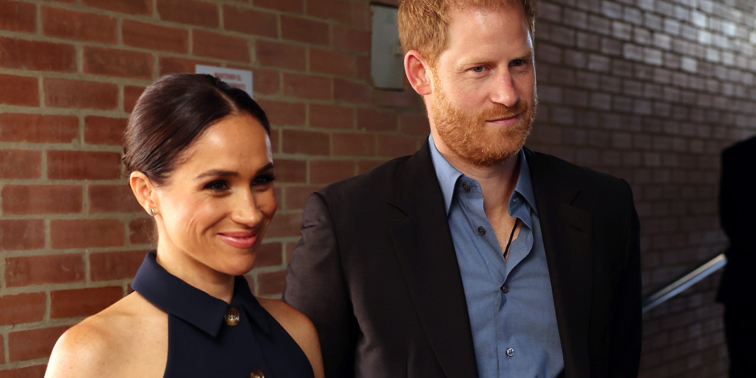 Meghan Markle's Navy Sleeveless Suit Is The Epitome Of Cali Cool