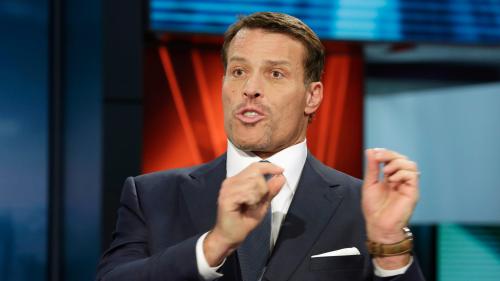 Lawsuit Accuses Tony Robbins of Discriminating Against Employee Who Got COVID