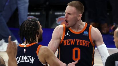 Getty Images - NEW YORK, NEW YORK - APRIL 22: Donte DiVincenzo #0 reacts with Jalen Brunson #11 of the New York Knicks as Kelly Oubre Jr. #9 of the Philadelphia 76ers looks on during the second half in Game Two of the Eastern Conference First Round Playoffs at Madison Square Garden on April 22, 2024 in New York City. The Knicks won 104-101. NOTE TO USER: User expressly acknowledges and agrees that, by downloading and or using this photograph, User is consenting to the terms and conditions of the Getty Images License Agreement. (Photo by Sarah Stier/Getty Images)