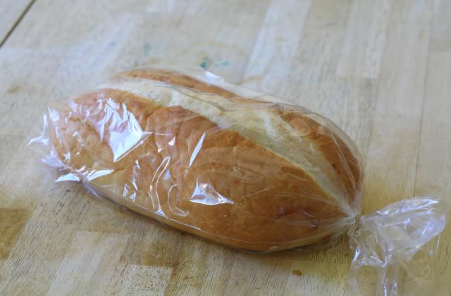 Loaf of bread in a clear plastic bag