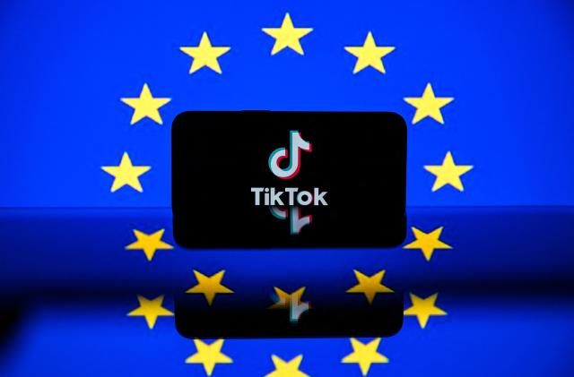 This picture taken on April 26, 2023 in Toulouse, southwestern France, shows a screen displaying the Tiktok social media platform's logo and the European flag. - European commissioner for the Internal Market Thierry Breton unveiled a list of 19 online platforms, including Instagram, TikTok and Twitter, as having user numbers so big they will come under stricter regulatory rules for content. The list which also includes services from Amazon, Google, Meta, Instagram and Microsoft puts them in a category under a new EU law, known as the Digital Services Act (DSA), imposing measures from August such as annual audits and a duty to effectively counter disinformation and hate content. (Photo by Lionel BONAVENTURE / AFP) (Photo by LIONEL BONAVENTURE/AFP via Getty Images)