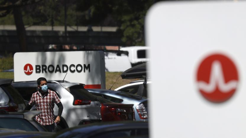 SAN JOSE, CALIFORNIA - JUNE 03: An employee walks through the parking lot at a Broadcom office on June 03, 2021 in San Jose, California. Chipmaker Broadcom will report second quarter earnings today after the closing bell and is expected to beat analyst expectations. (Photo by Justin Sullivan/Getty Images)