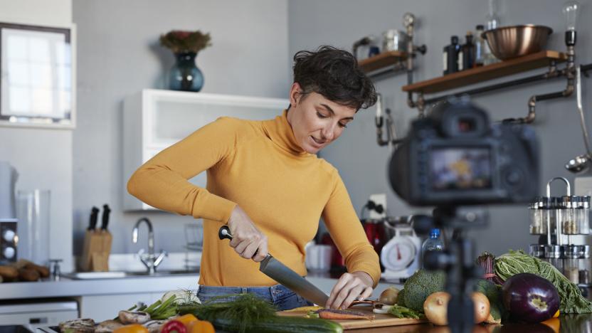 Vlogger making making video at home in stylish urban apartment