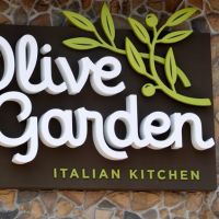 People aren't going to Olive Garden as much — but the stock is jumping on a new Uber deal