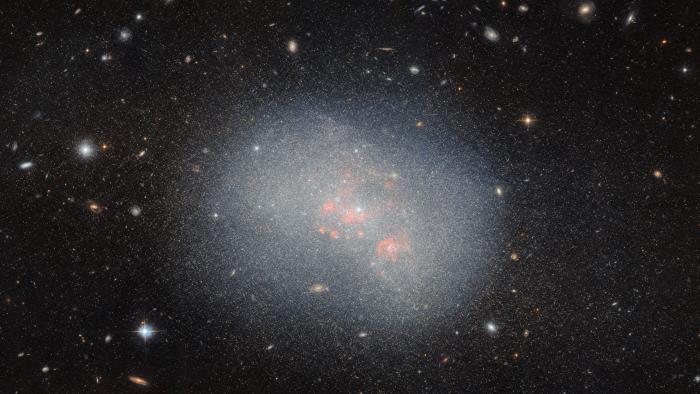 A dwarf galaxy called NGC 5238, as imaged by the Hubble Space Telescope.