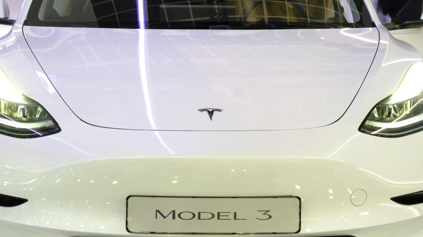 BRUSSELS, BELGIUM - JANUARY 13: The Tesla Logo is seen on a Model 3 during the press opening of the 100th edition of the Brussels Motor Show, in the Heysel Park, on Friday January 13, 2023, in Brussels, Belgium. The 100th edition of the Brussels Motor Show will be the scene of several automobile unveilings, as well as hosting the Car Of The Year election. (Photo by Thierry Monasse/Getty Images)
