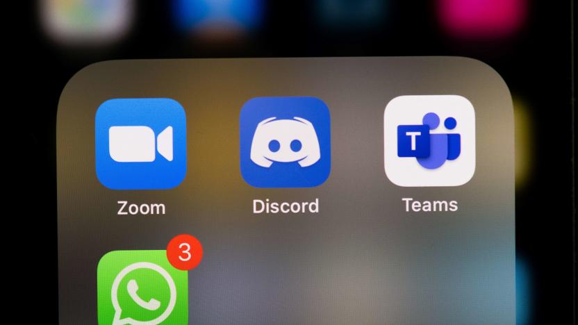 This illustration picture taken on May 27, 2020 in Paris shows the logos of the social networks  applications Zoom, Discord, Teams and WhatsApp on the screen of a phone. (Photo by Martin BUREAU / AFP) (Photo by MARTIN BUREAU/AFP via Getty Images)