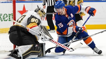 Islanders place four players on COVID list