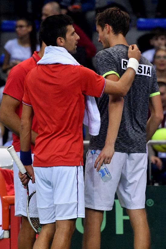 Djokovic survives Davis Cup scare, champions Argentina slump