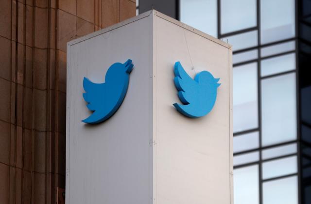 A Twitter logo is seen outside the company headquarters, during a purported demonstration by supporters of U.S. President Donald Trump to protest the social media company's permanent suspension of the President's Twitter account, in San Francisco, California, U.S., January 11, 2021. REUTERS/Stephen Lam