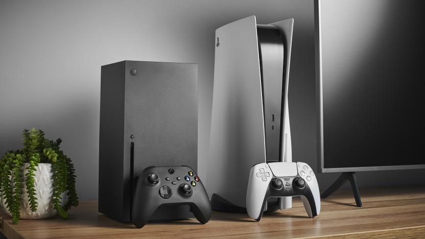 Living room with Microsoft Xbox Series X (L) and Sony PlayStation 5 home video game consoles alongside a television and soundbar, taken on November 3, 2020. (Photo by Phil Barker/Future Publishing via Getty Images)