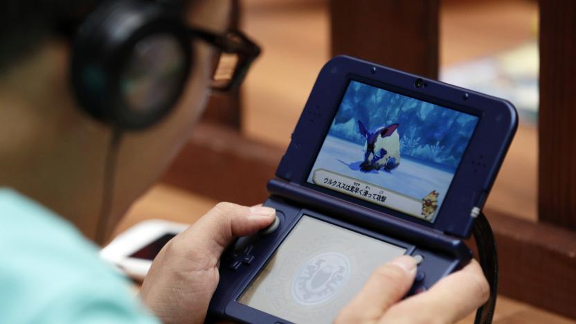 CHIBA, JAPAN - SEPTEMBER 16:  A visitor plays a video game on a Nintendo Co. 3DS LL portable video game player at the Tokyo Game Show 2016 on September 16, 2016 in Tokyo, Japan. The Tokyo Game Show 2016 is held from September 15 to Septem  (Photo by Tomohiro Ohsumi/Getty Images)