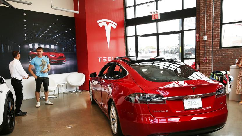 NEW YORK, NY - JULY 05:  A Tesla model S sits parked in a new Tesla showroom and service center in Red Hook, Brooklyn on July 5, 2016 in New York City. The electric car company and its CEO and founder Elon Musk have come under increasing scrutiny following a crash of one of its electric cars while using the controversial autopilot service. Joshua Brown crashed and died in Florida on May 7 in a Tesla car that was operating on autopilot, which means that Brown's hands were not on the steering wheel.  (Photo by Spencer Platt/Getty Images)