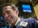 Dow, S&P 500 close at record highs, rate-cut euphoria lifts Nasdaq