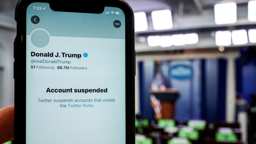 A photo illustration shows the suspended Twitter account of U.S. President Donald Trump on a smartphone at the White House briefing room in Washington, U.S., January 8, 2021.  REUTERS/Joshua Roberts/Illustration