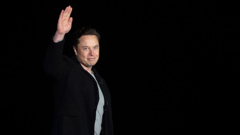 Elon Musk gestures as he speaks during a press conference at SpaceX's Starbase facility near Boca Chica Village in South Texas on February 10, 2022. - Billionaire entrepreneur Elon Musk delivered an eagerly-awaited update on SpaceX's Starship, a prototype rocket the company is developing for crewed interplanetary exploration. (Photo by JIM WATSON / AFP) (Photo by JIM WATSON/AFP via Getty Images)