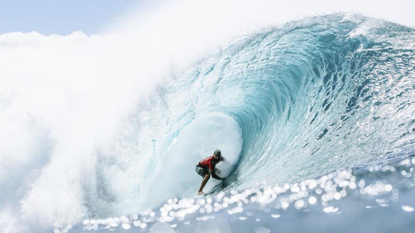 A surfer inside a barreling wave.