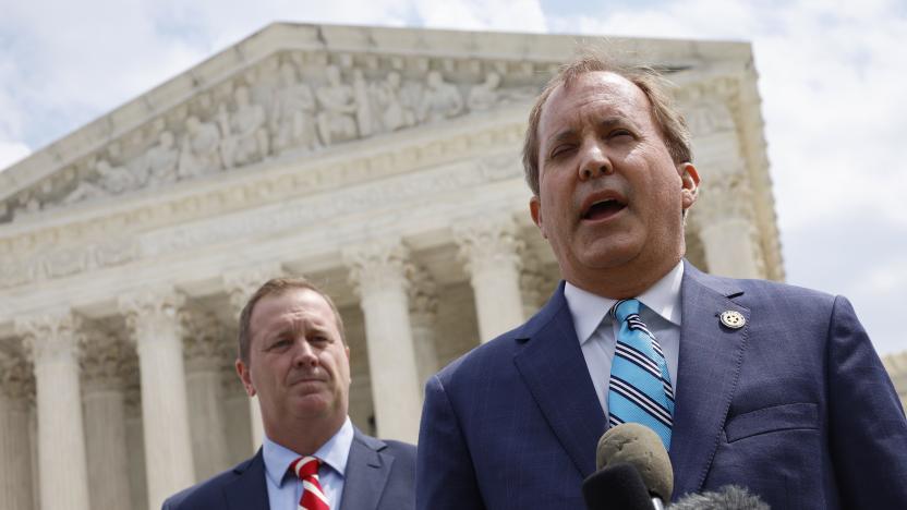 WASHINGTON, DC - APRIL 26: Texas Attorney General Ken Paxton (R) and Missouri Attorney General Eric Schmitt talk to reporters after the U.S. Supreme Court heard arguments in their case about Title 42 on April 26, 2022 in Washington, DC. Paxton and Schmitt, who is running for the U.S. Senate in Missouri, are suing to challenge the the Biden Administration's repeal of the Trump Migrant Protection Protocols—aka “Remain in Mexico.”  (Photo by Chip Somodevilla/Getty Images)